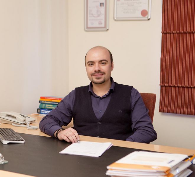 Dr. Erkan Kuru